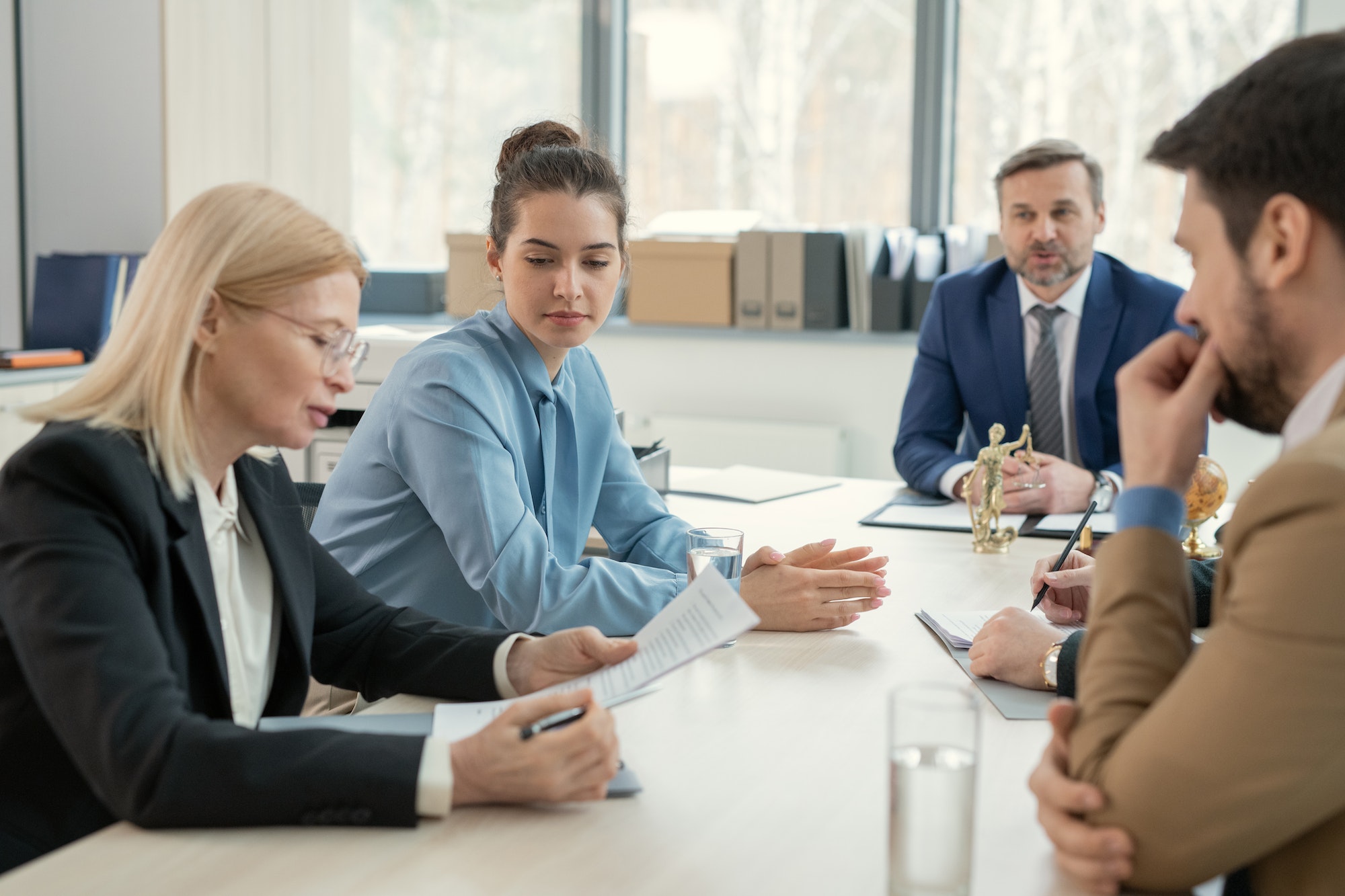 Analyzing document at meeting with lawyers